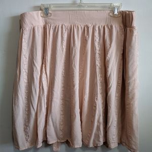 Pink Torrid skater skirt with floral details